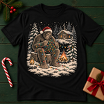 Bigfoot Christmas Campfire T-Shirt — Sasquatch Santa Winter Cabin Graphic Tee
